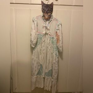 Fillyboo carnival duster in color “lagoon” size large. Mint condition
